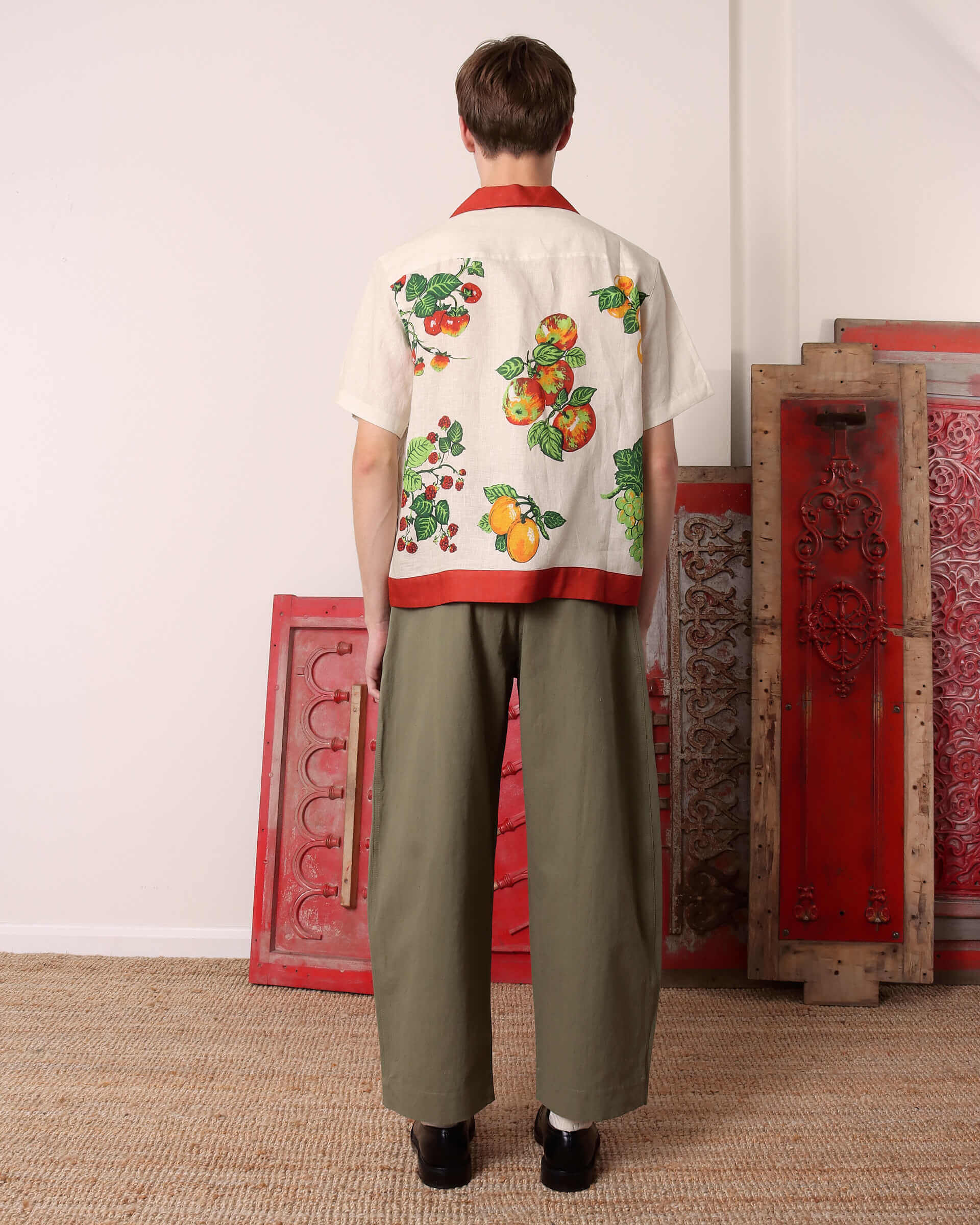 The model shows the back of the short sleeve 'Picnic' Shirt.