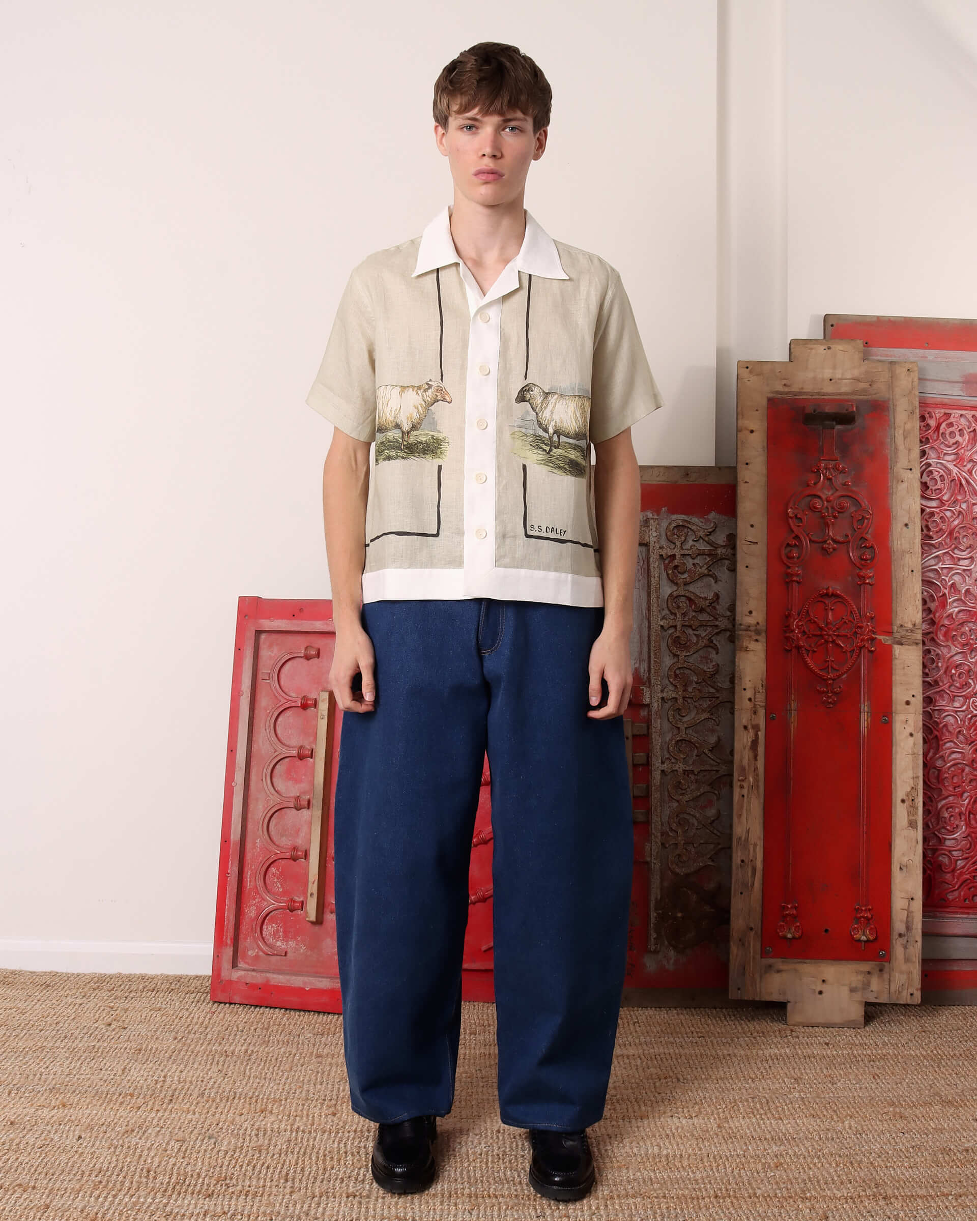 A model wears the 'Lancashire' Sheep Shirt with a pair of blue denim.