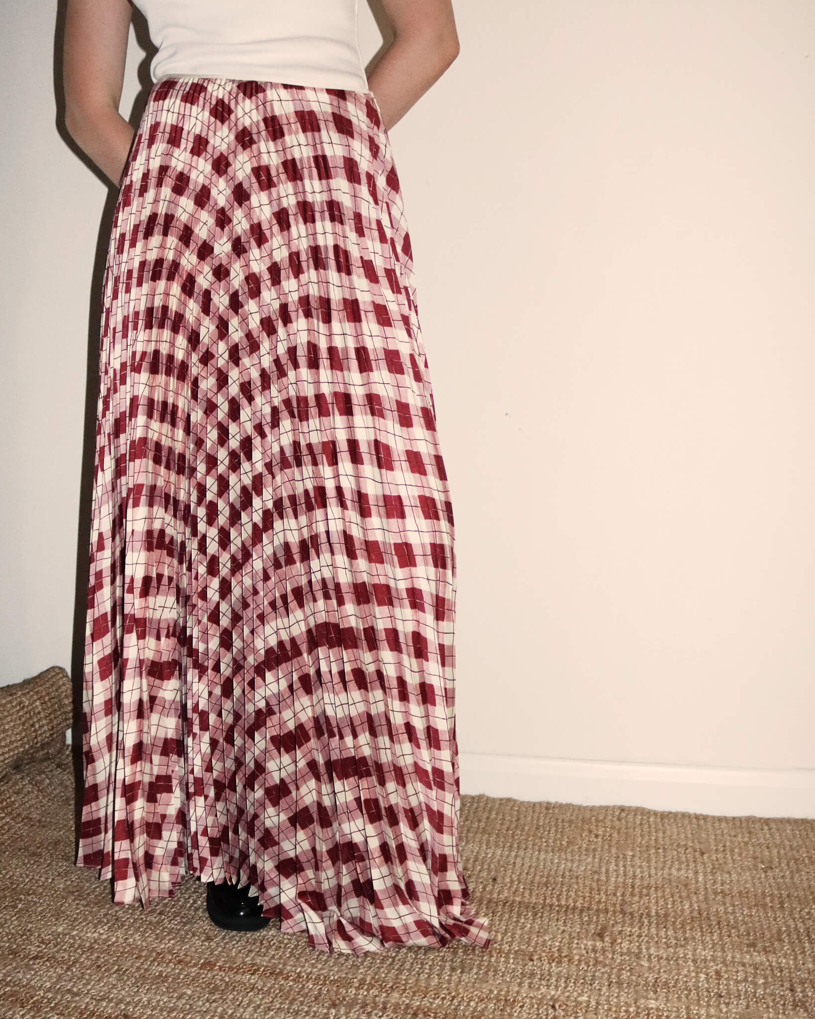 Close-up of rthe maxi 'Kate' Argyle pleated skirt.