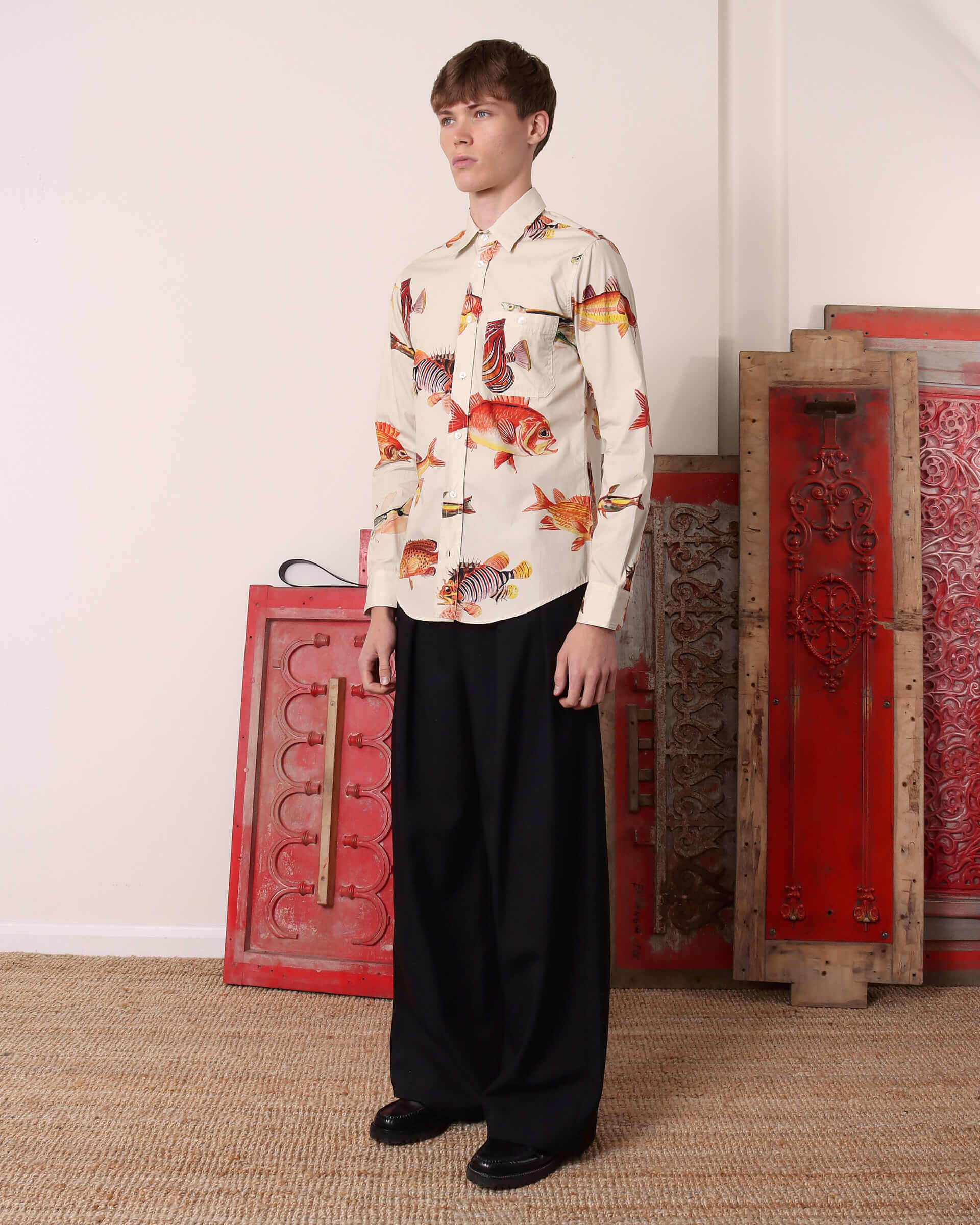 A model wears the 'Benjamin' Long Sleeve Shirt with black 'George' trousers.