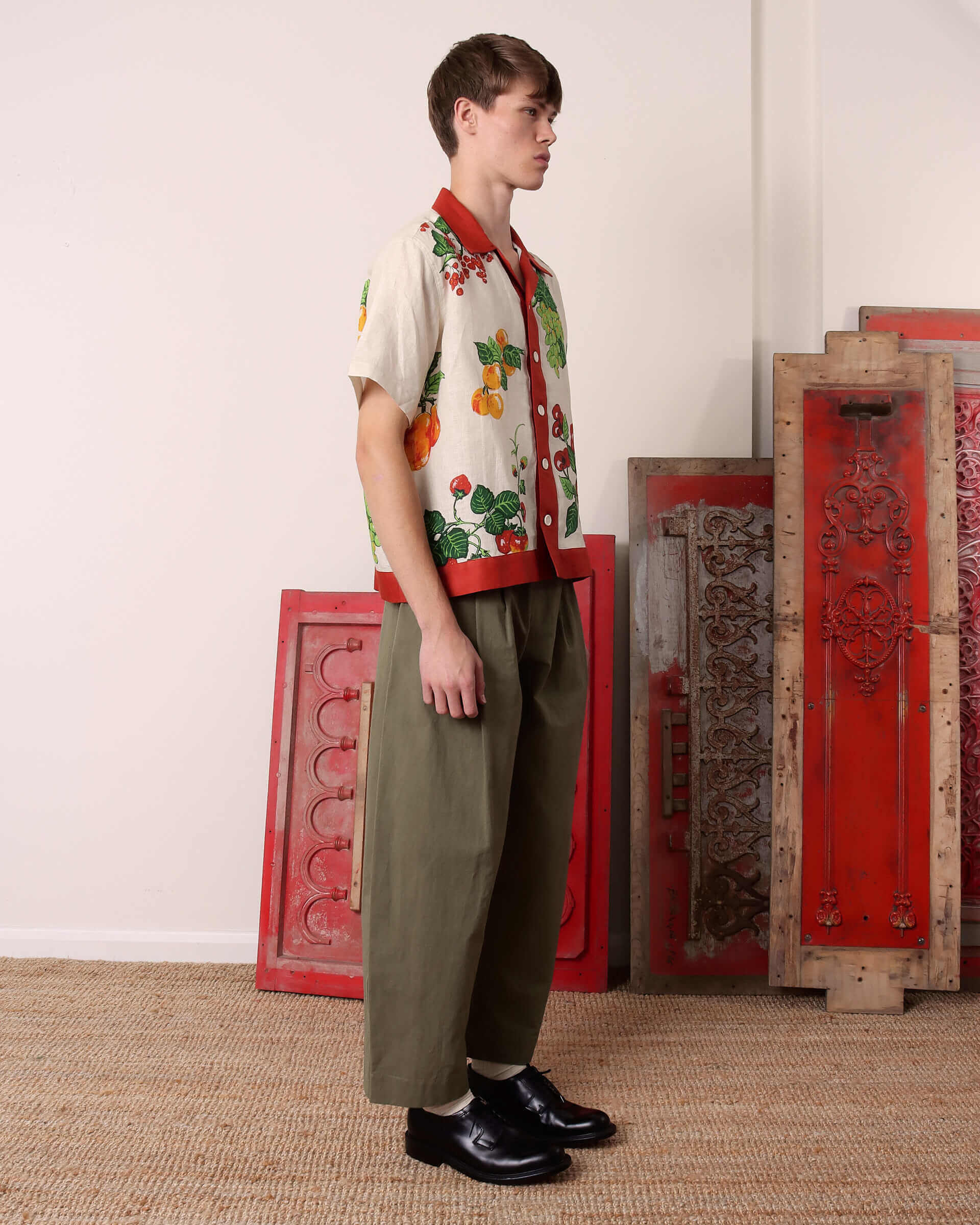 A model shows the side of the 'Picnic' Shirt. 