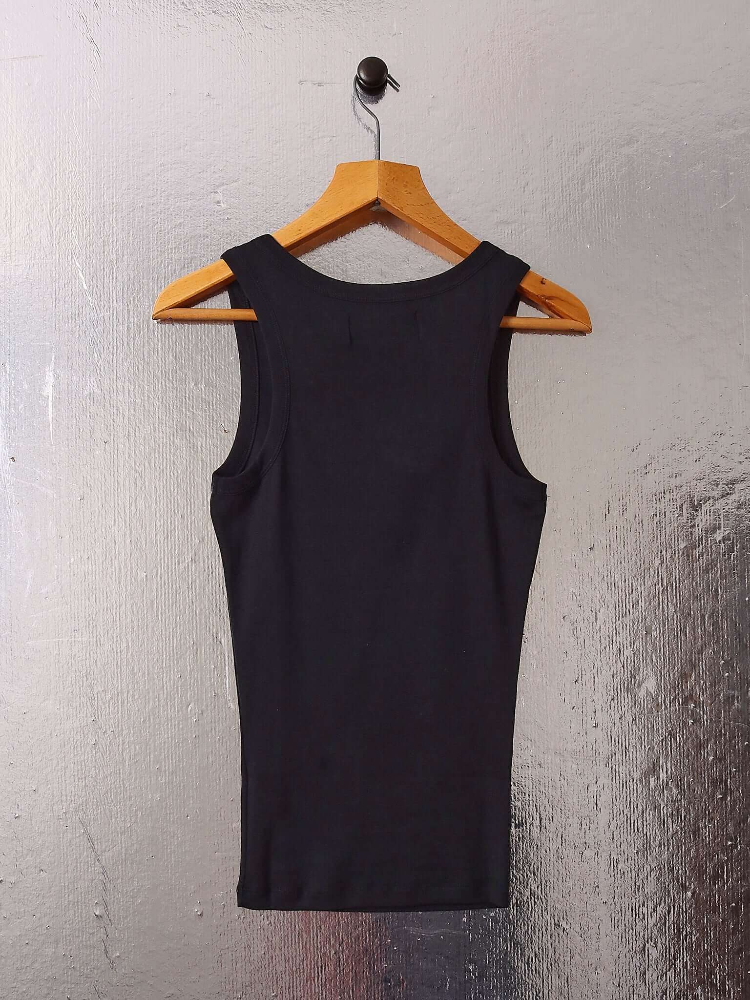 A flat shot of the back of the  the 'Cochrane' Vest in black.