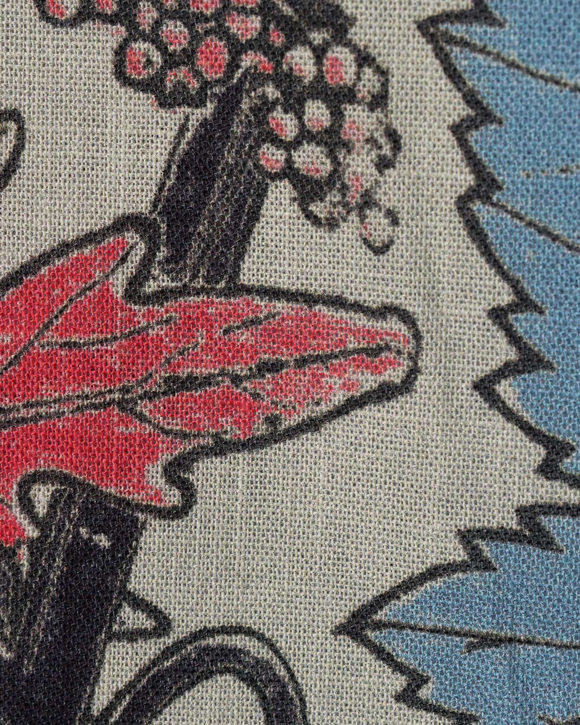 A close-up of the 100% linen fabric and leaf print motif of the 'Otis' Short Sleeve Shirt.