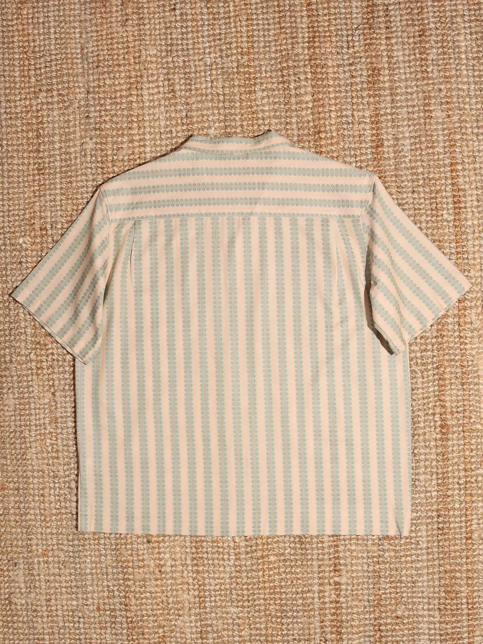 A flat shot shows the back of the 'Arte' Shirt with short sleeves.